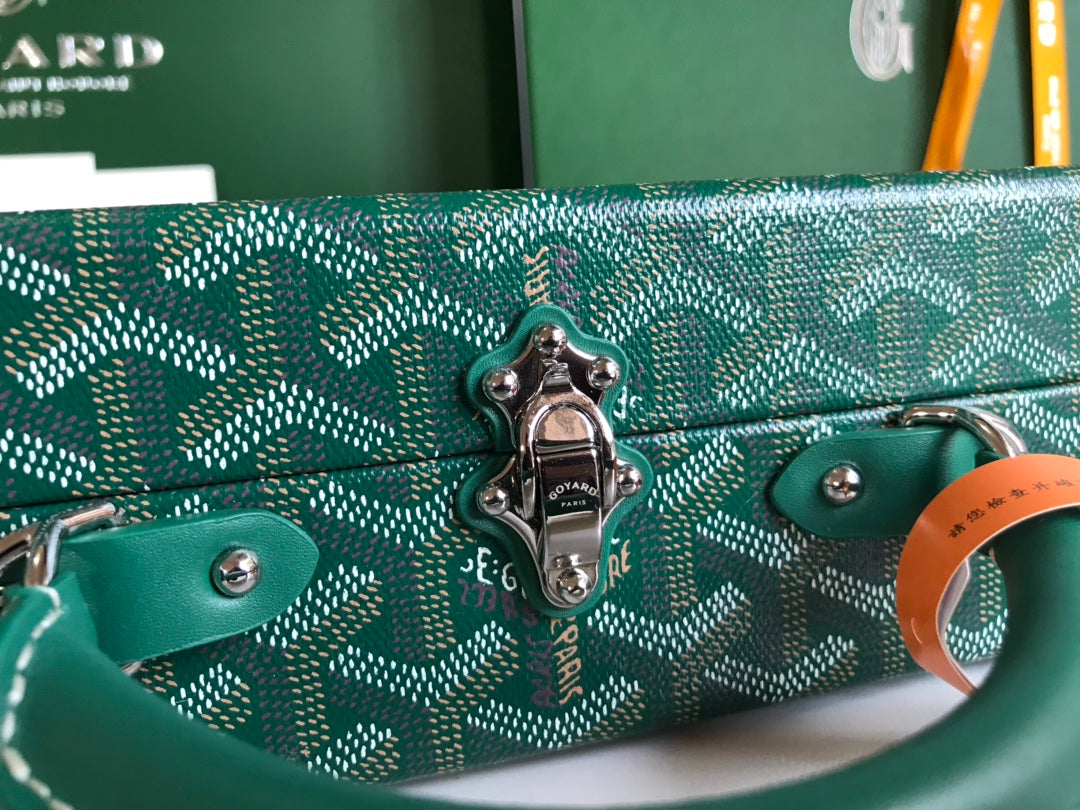 GRAND HÔTEL TRUNK BAG 24 EN TOILE GOYARDINE VERTE ET CUIR DE VEAU
