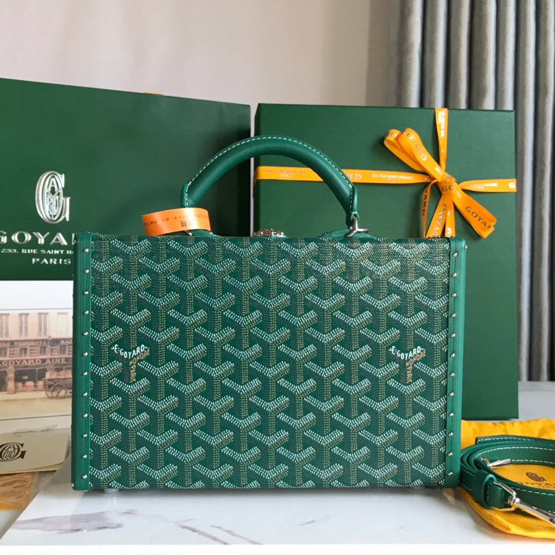 GRAND HÔTEL TRUNK BAG 24 EN TOILE GOYARDINE VERTE ET CUIR DE VEAU