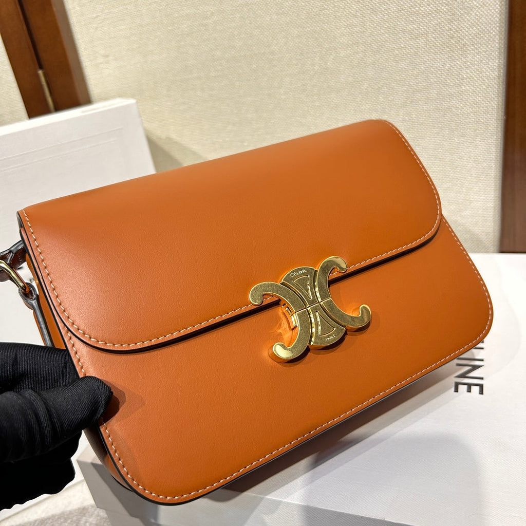 TRIOMPHE 22 BROWN CALFSKIN GOLD HARDWARE
