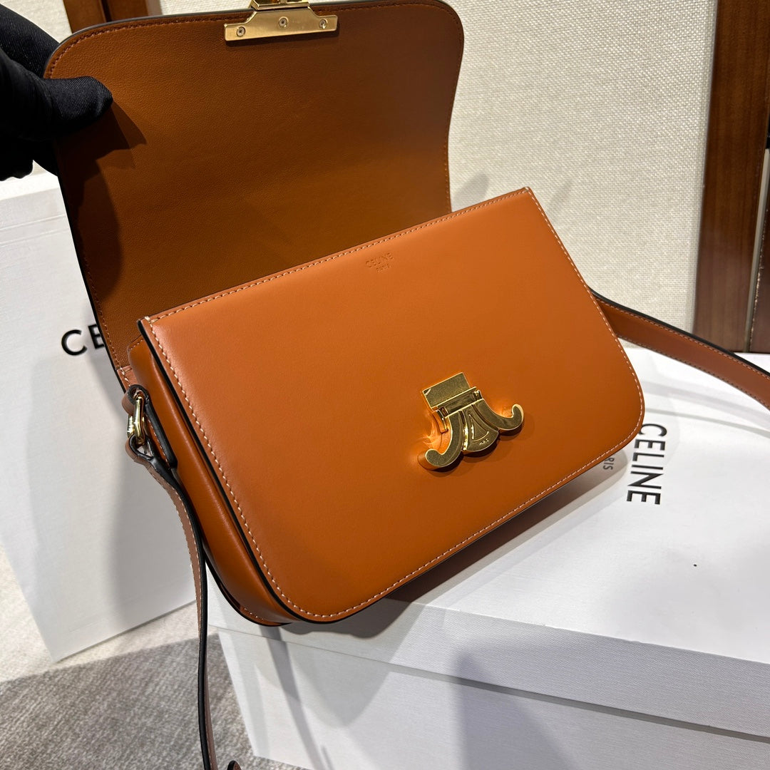 TRIOMPHE 22 CUIR DE VEAU MARRON ACIER DORÉ