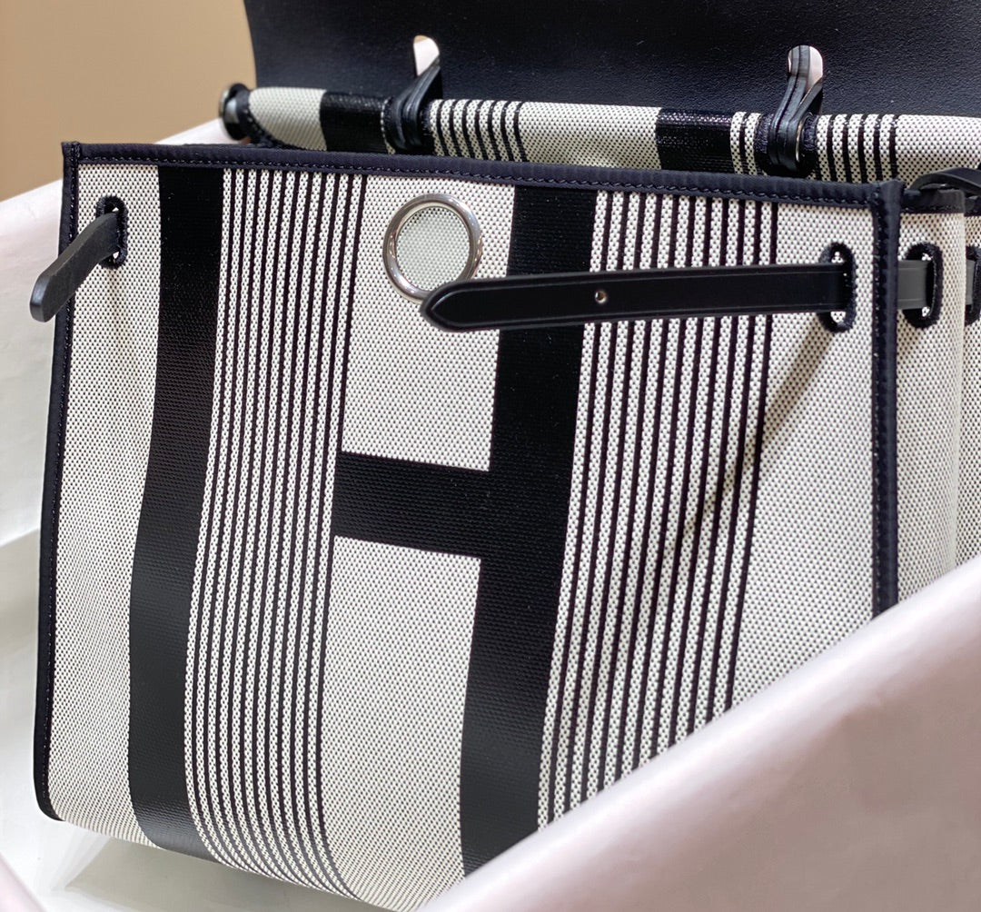 HERBAG 31 TOILE WHITE BLACK CANVAS BLACK COWHIDE LEATHER