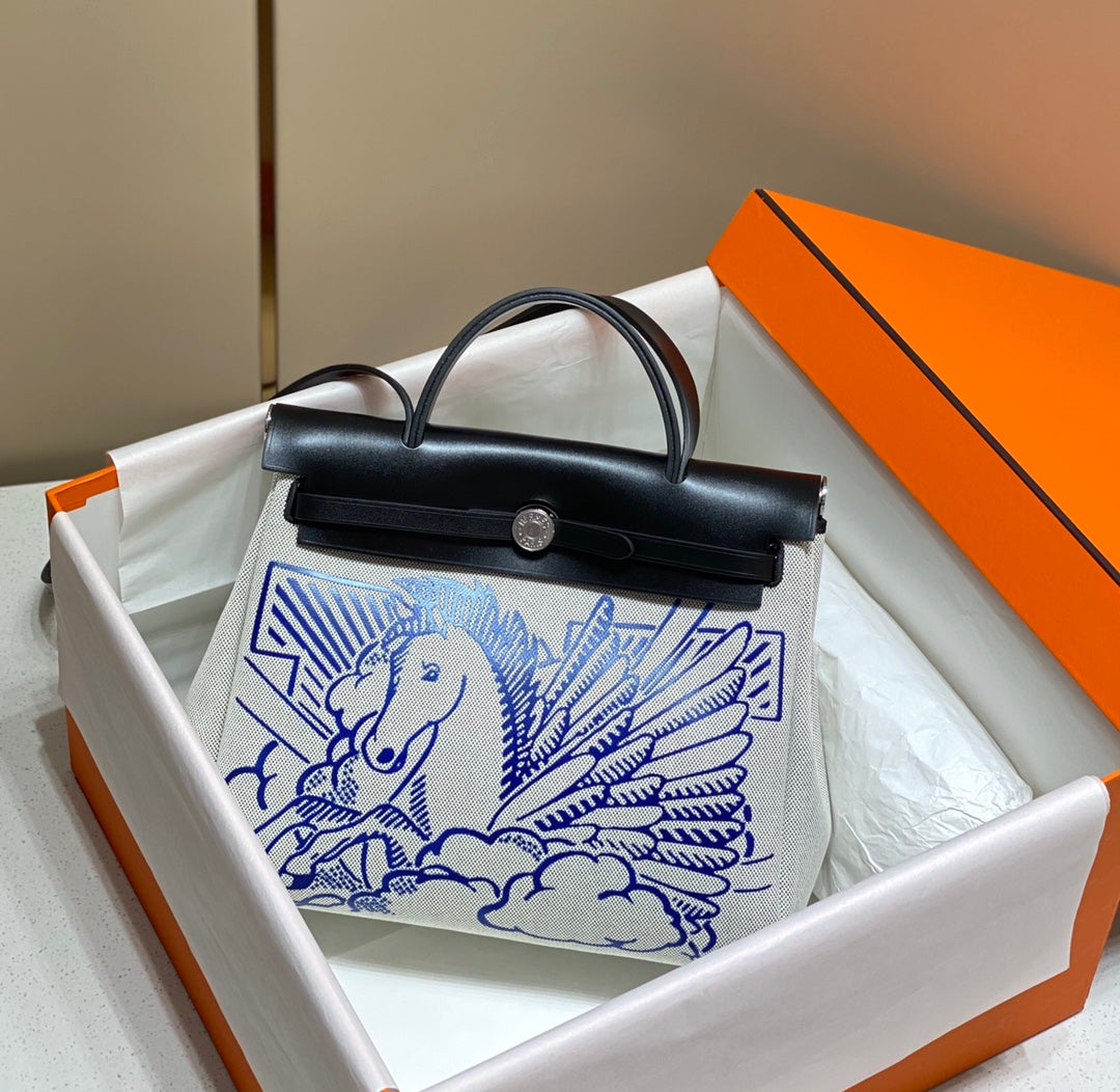 HM PEGASE POP HERBAG ZIP 31 WHITE BLUE CANVAS BLACK COWHIDE LEATHER