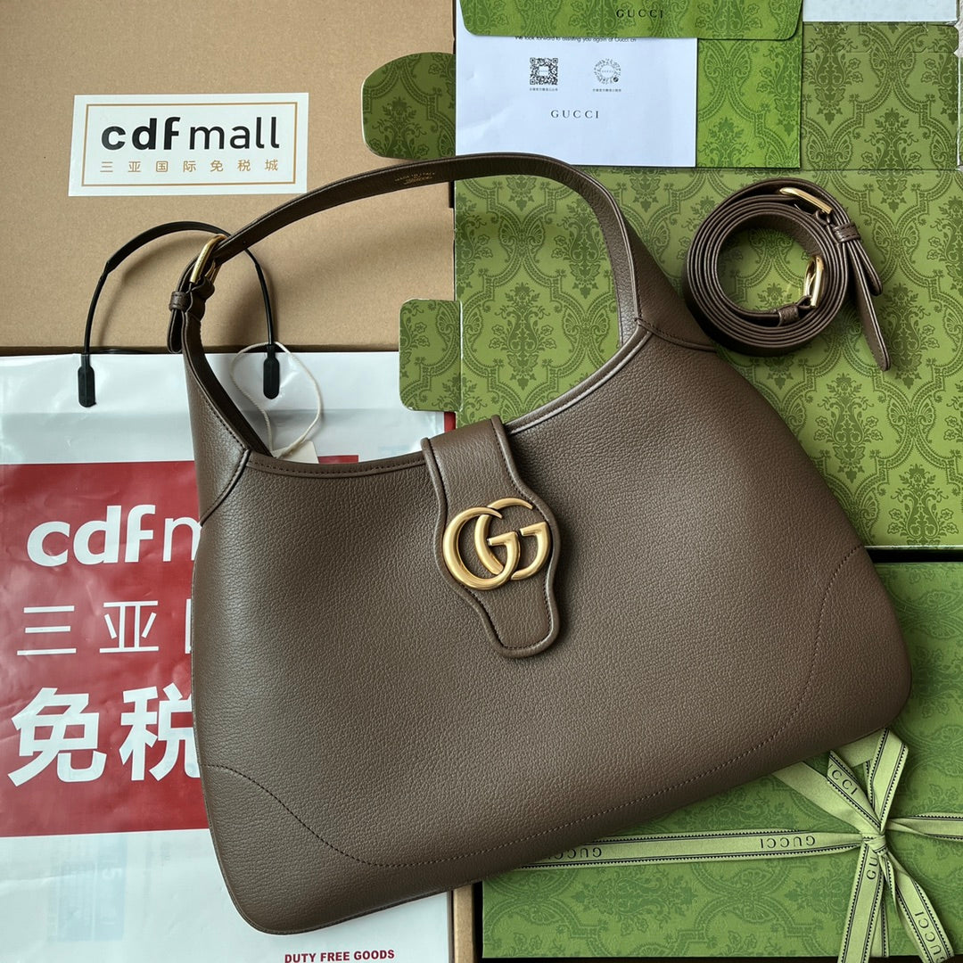 SAC À BANDOULIÈRE MOYEN 39 EN CUIR DE VEAU CAFÉ QUINCAILLERIE DORÉ