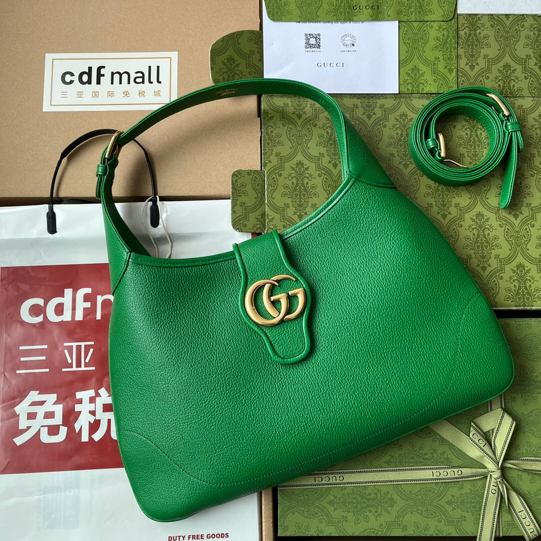 SAC À BANDOULIÈRE MOYEN 39 EN CUIR DE VEAU VERT, QUINCAILLERIE DORÉ