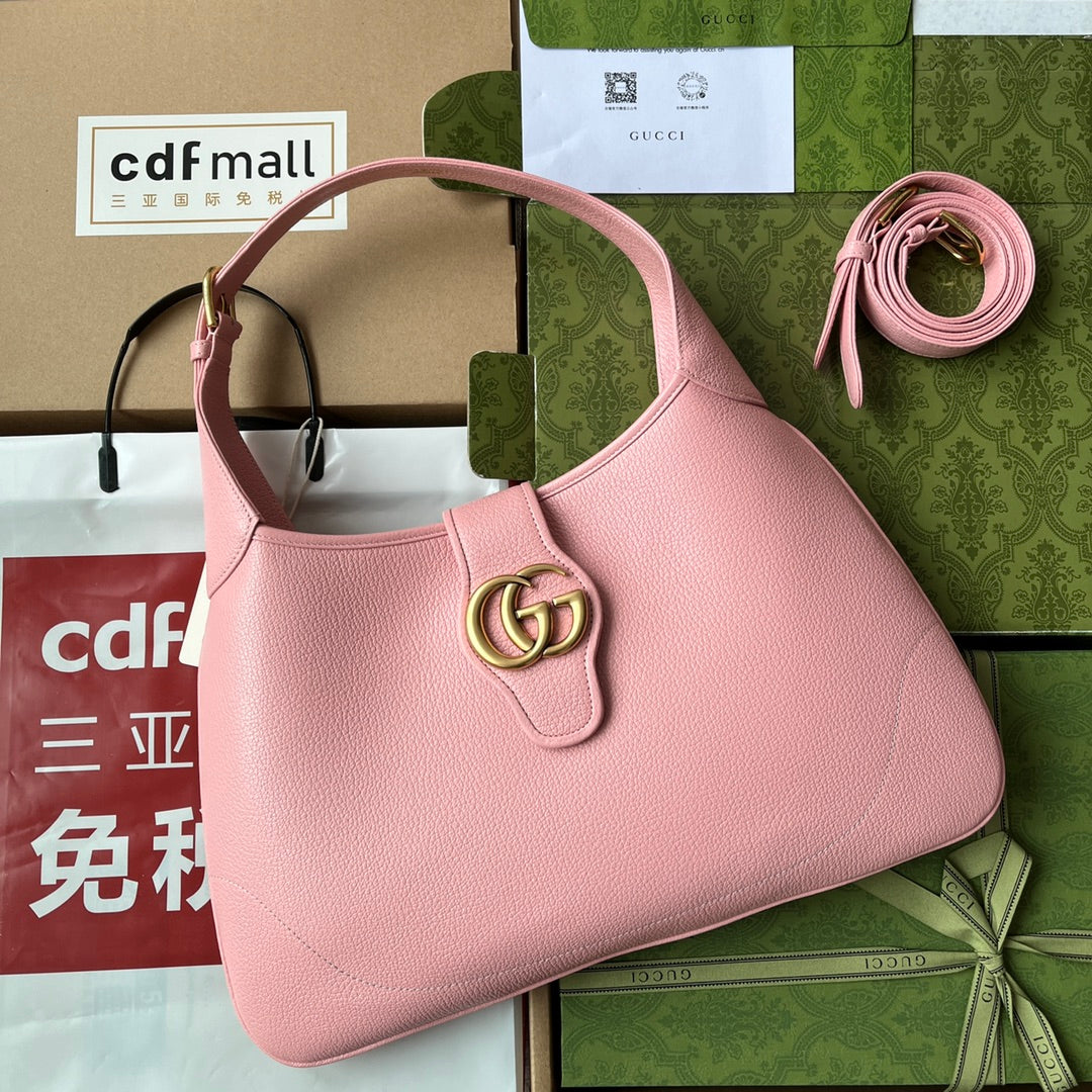 SAC À BANDOULIÈRE MOYEN 39 EN CUIR DE VEAU ROSE CLAIR, QUINCAILLERIE DORÉ