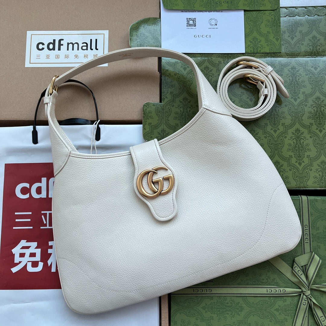SAC À BANDOULIÈRE MOYEN 39 EN CUIR DE VEAU BLANC QUINCAILLERIE DORÉ