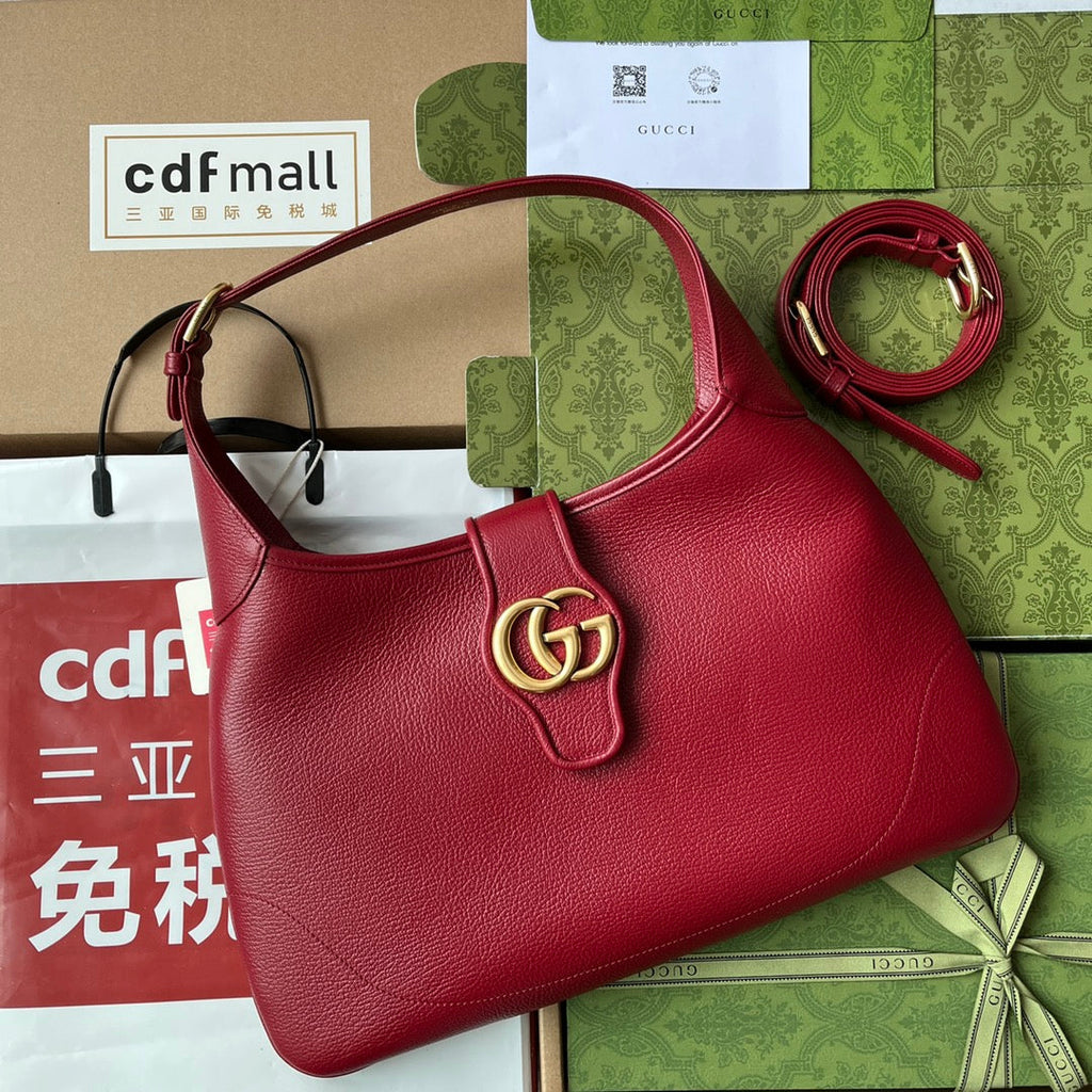 SAC À BANDOULIÈRE MOYEN 39 EN CUIR DE VEAU ROUGE QUINCAILLERIE DORÉ