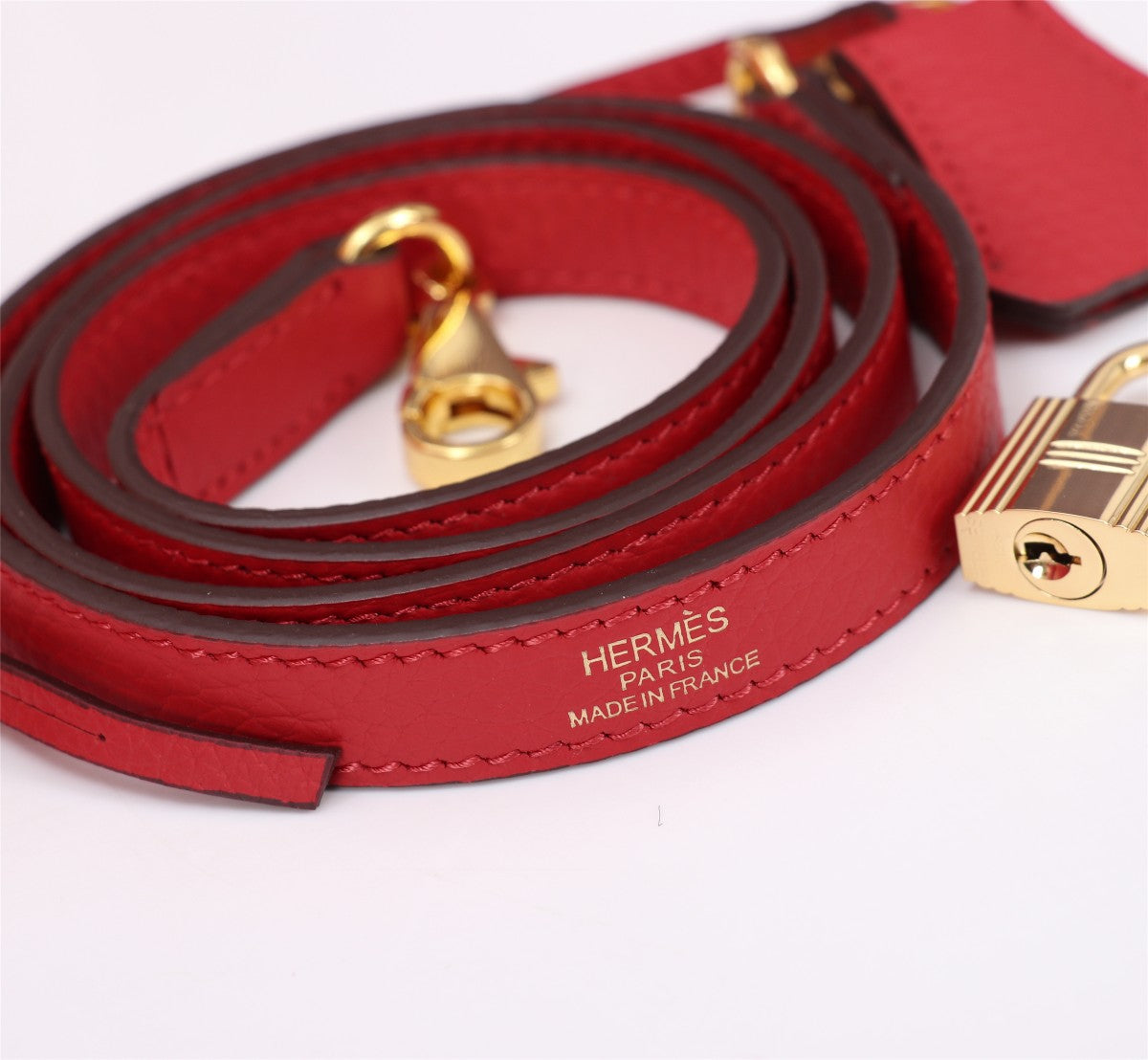 SAC HM KELLY 25 ROUGE TOGO QUINCAILLERIE OR