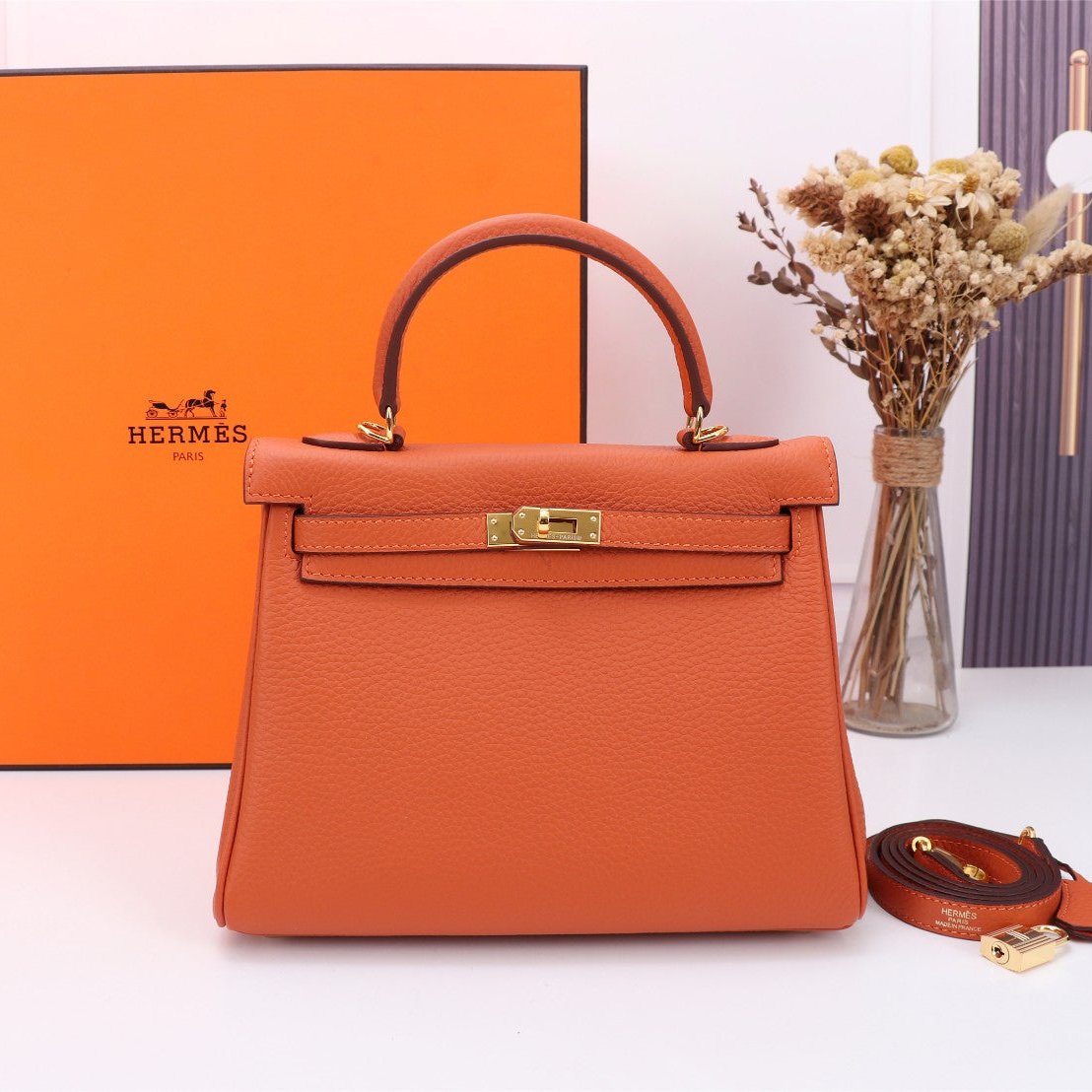 SAC HM KELLY 25 ORANGE TOGO QUINCAILLERIE OR