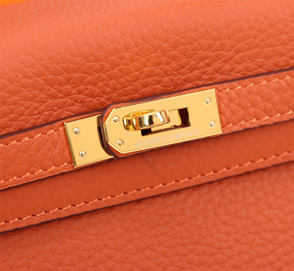 SAC HM KELLY 25 ORANGE TOGO QUINCAILLERIE OR
