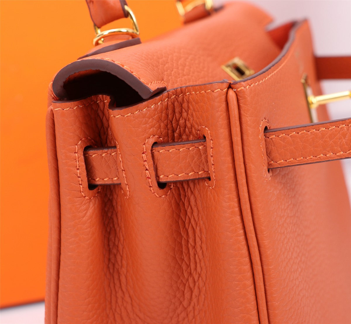 SAC HM KELLY 25 ORANGE TOGO QUINCAILLERIE OR