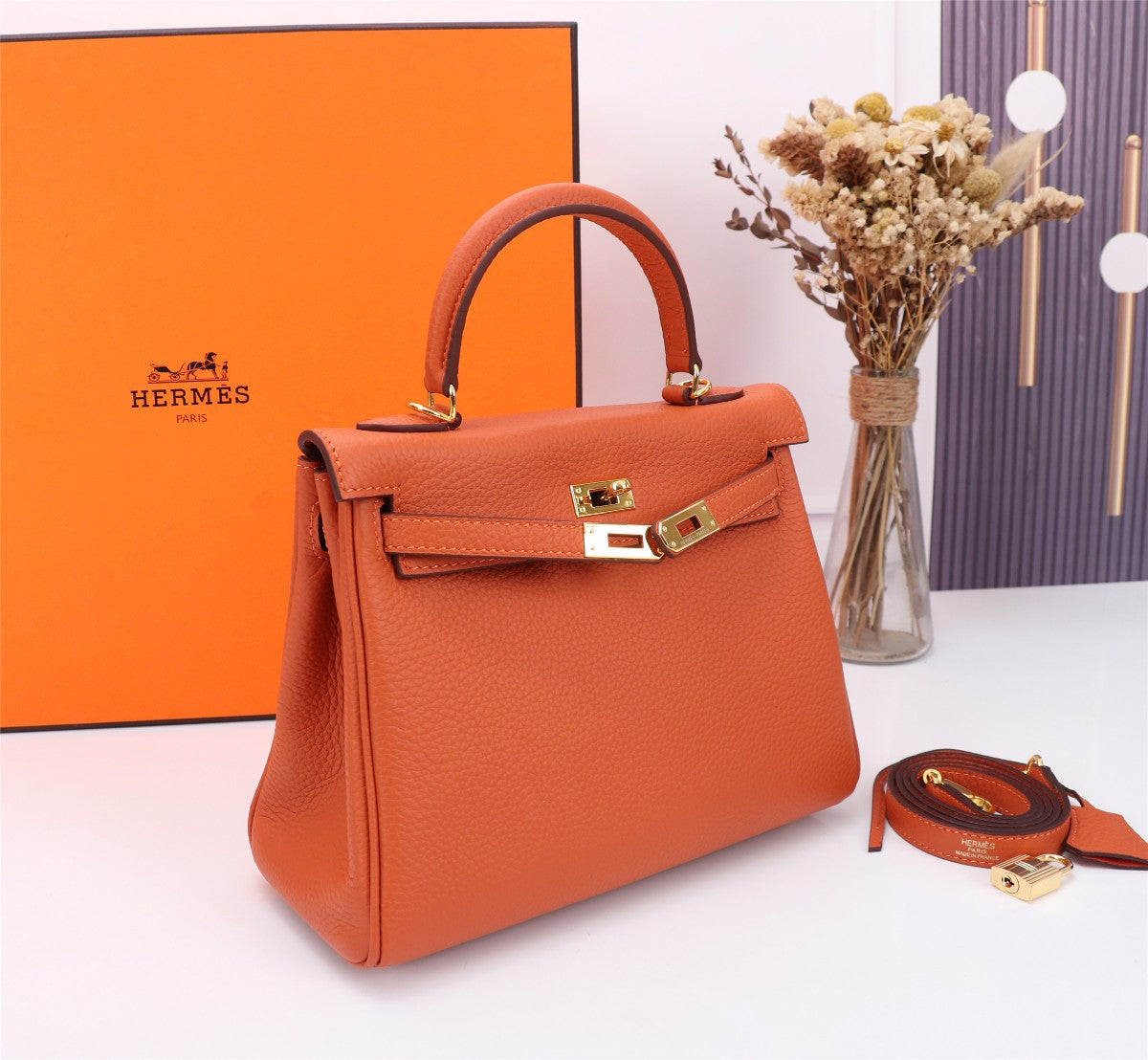 SAC HM KELLY 25 ORANGE TOGO QUINCAILLERIE OR