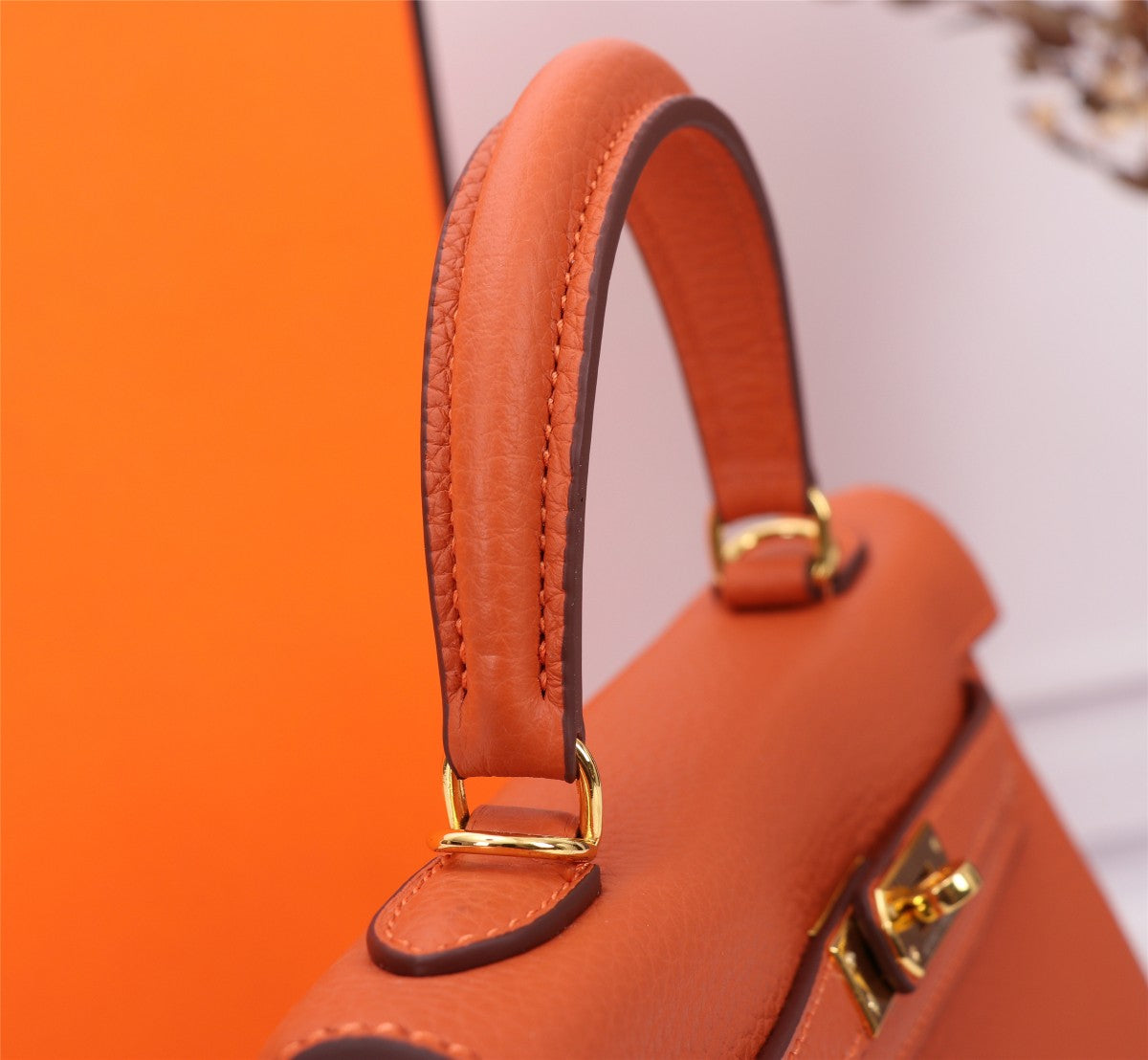 SAC HM KELLY 25 ORANGE TOGO QUINCAILLERIE OR