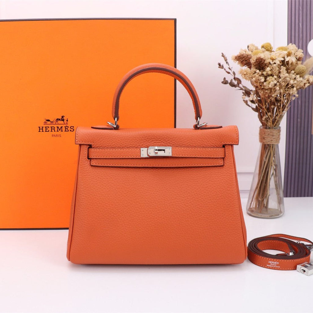SAC HM KELLY 25 ORANGE TOGO QUINCAILLERIE ARGENTÉE