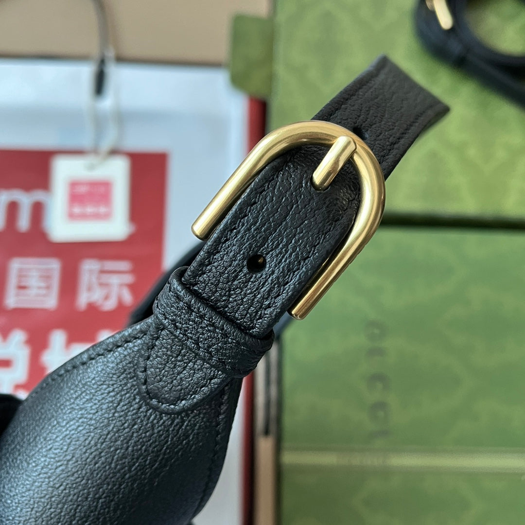 Petit sac bandoulière APHRODITE 27 en cuir de veau noir et métal doré