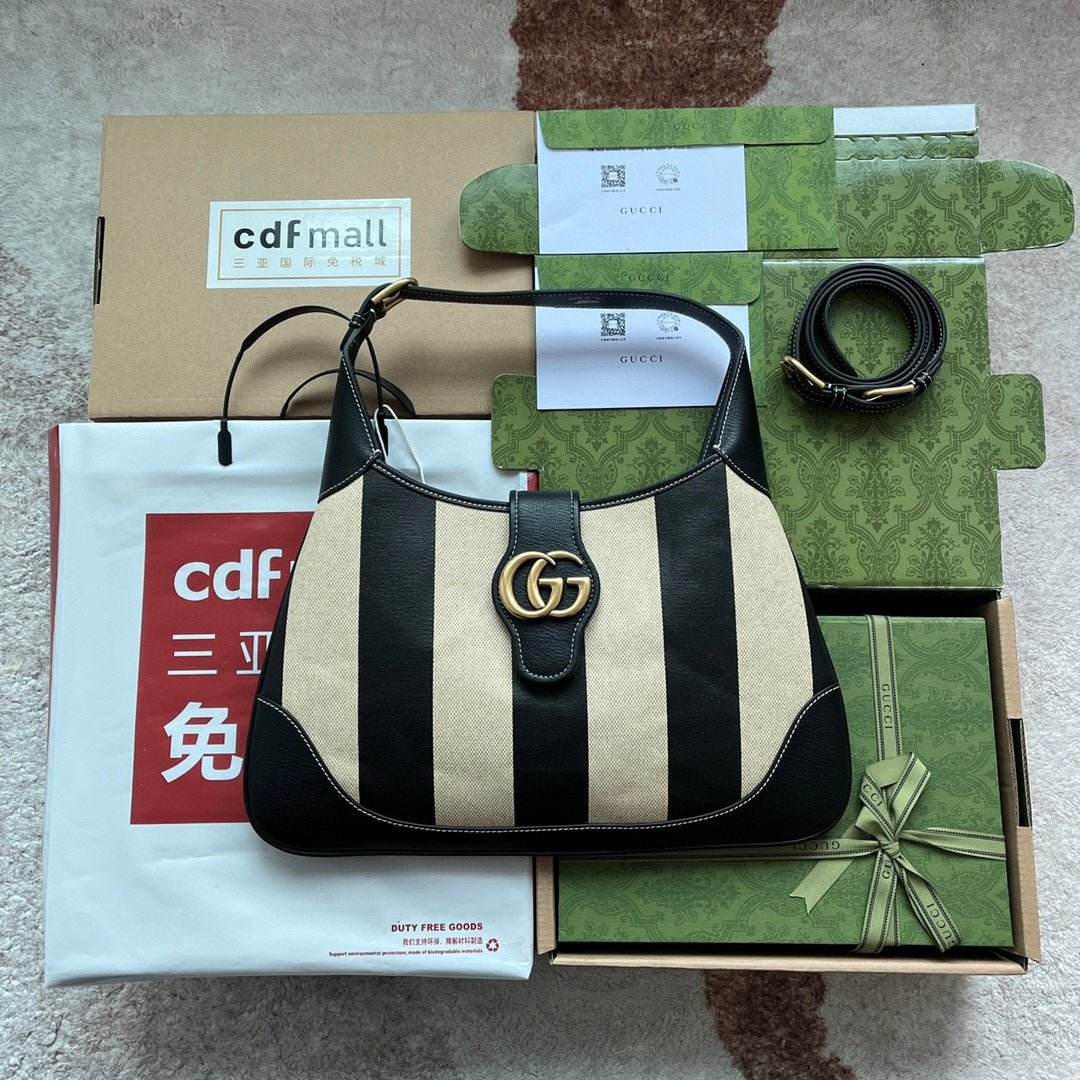 SAC À BANDOULIÈRE MOYEN 39 EN TOILE BEIGE MÉLANGÉE CUIR DE VEAU NOIR QUINCAILLERIE DORÉE