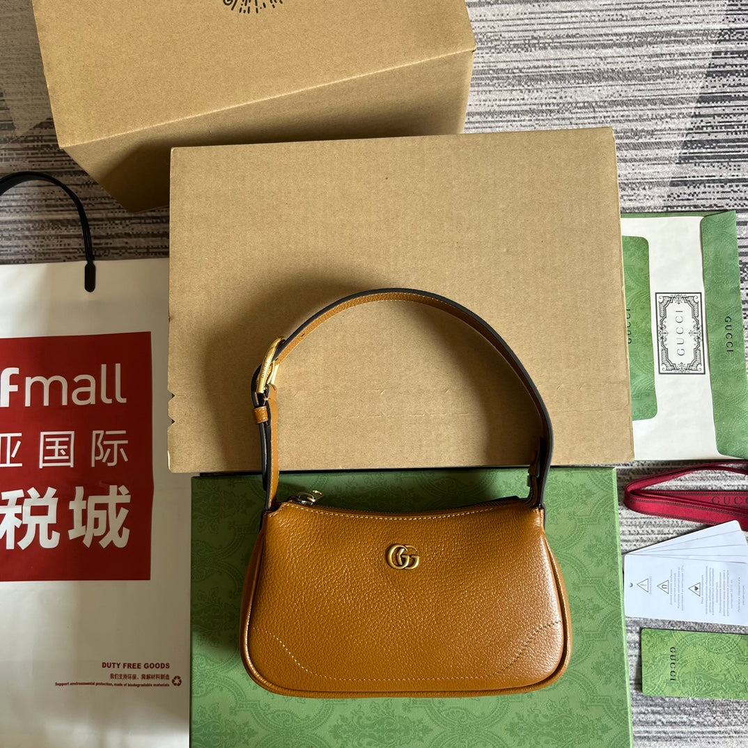 SAC À BANDOULIÈRE APHRODITE MINI 21 EN CUIR DE VEAU MARRON CARAMEL