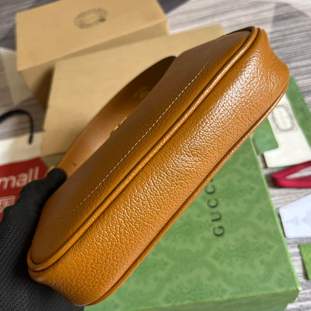 SAC À BANDOULIÈRE APHRODITE MINI 21 EN CUIR DE VEAU MARRON CARAMEL