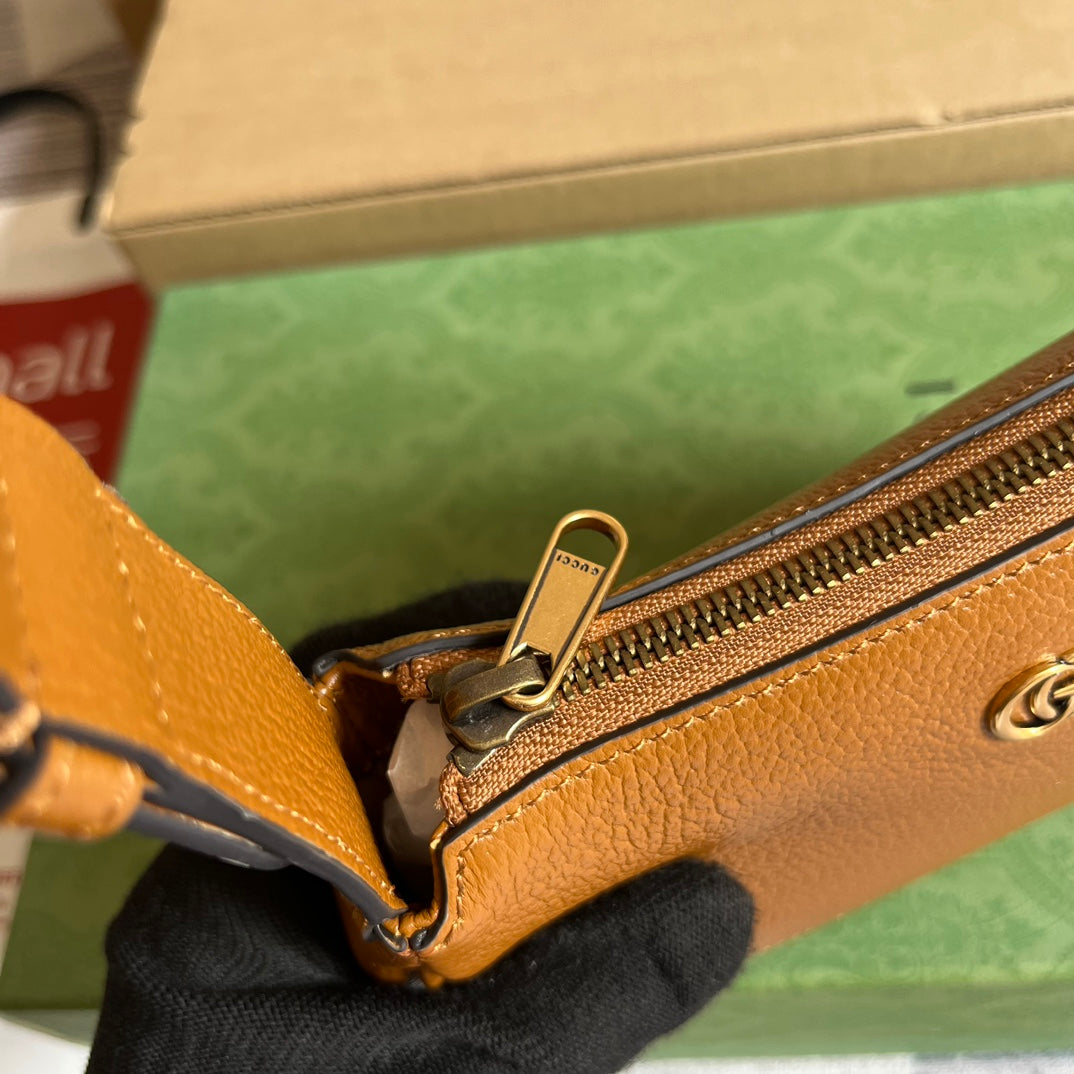 SAC À BANDOULIÈRE APHRODITE MINI 21 EN CUIR DE VEAU MARRON CARAMEL