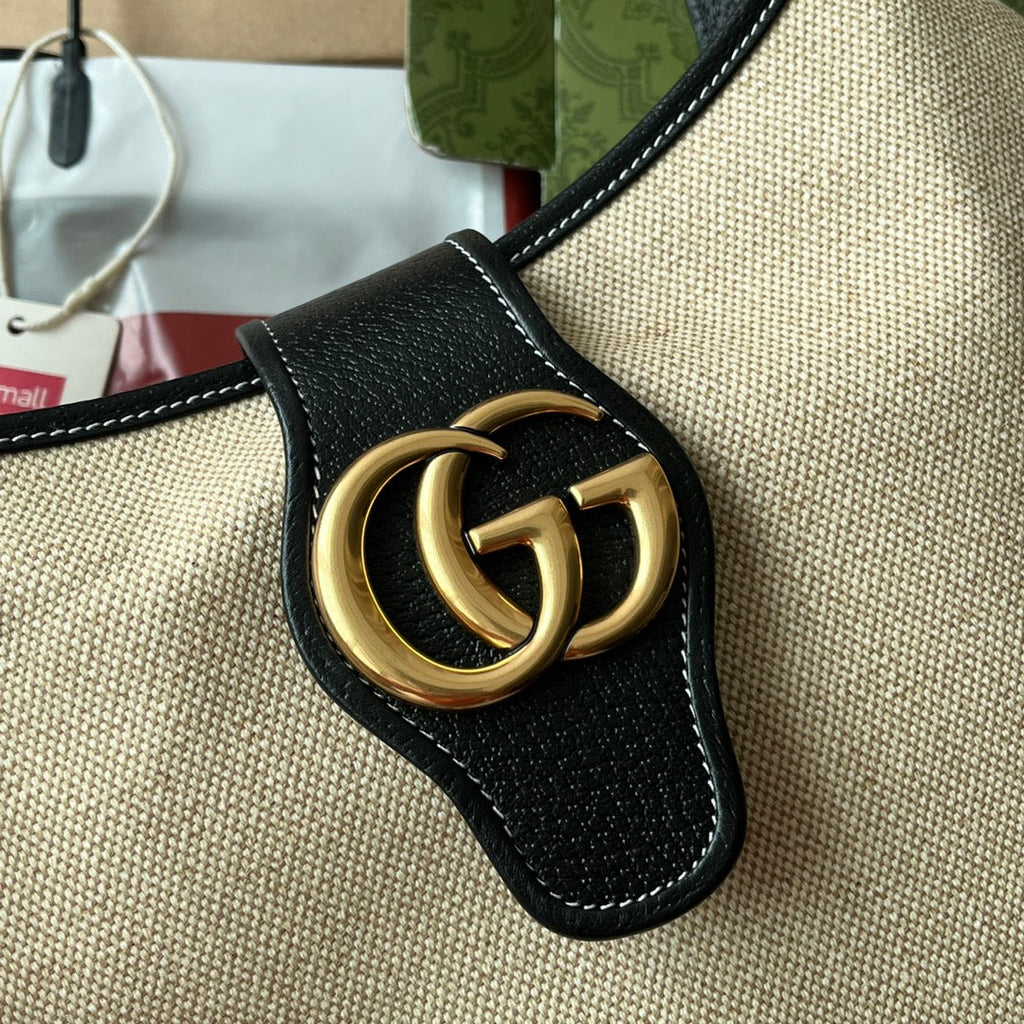 SAC APHRODITE MOYEN 39 EN TOILE BEIGE ET CUIR DE VEAU NOIR, QUINCAILLERIE DORÉ