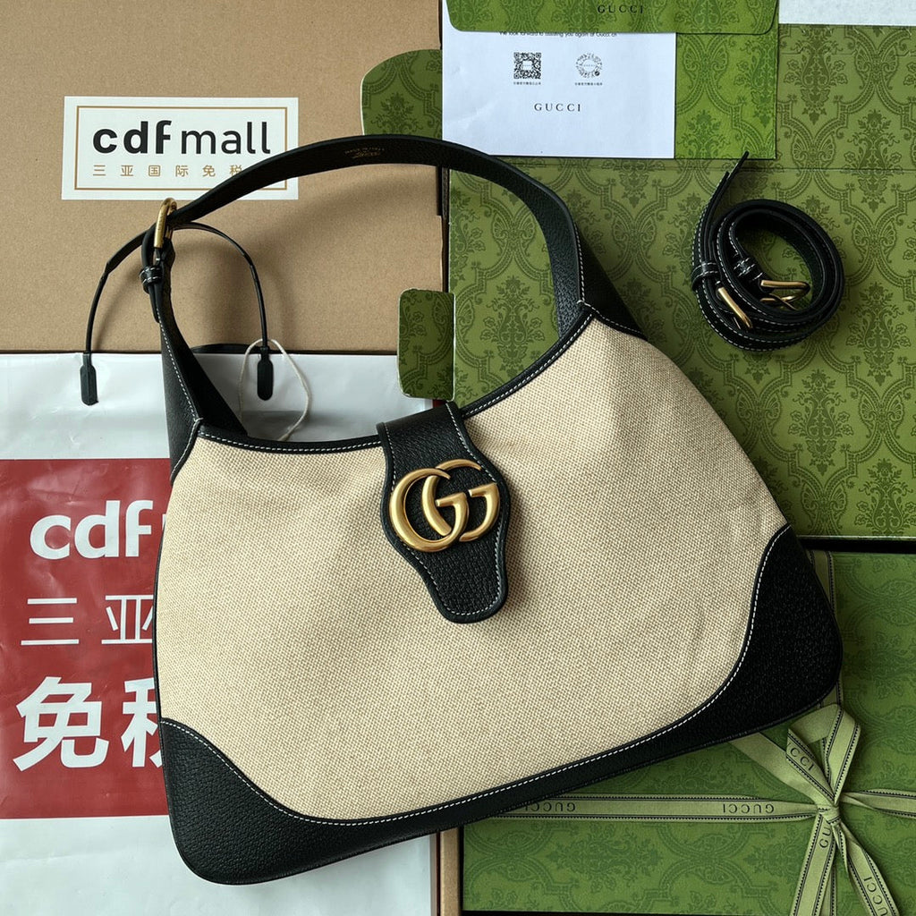 SAC APHRODITE MOYEN 39 EN TOILE BEIGE ET CUIR DE VEAU NOIR, QUINCAILLERIE DORÉ