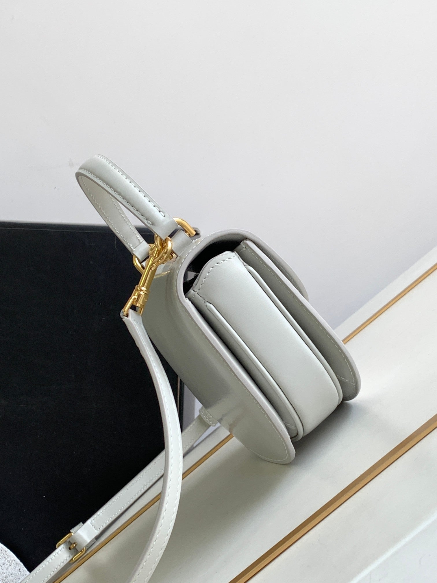 CHAINE TEEN BESACE TRIOMPHE 15,5CM CUIR DE VEAU GRIS