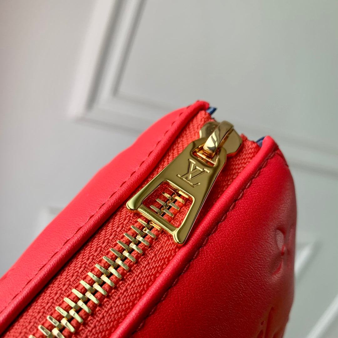 COUSSIN PM 26CM CUIR DE VEAU EMPREINTE MONOGRAMME ROUGE 