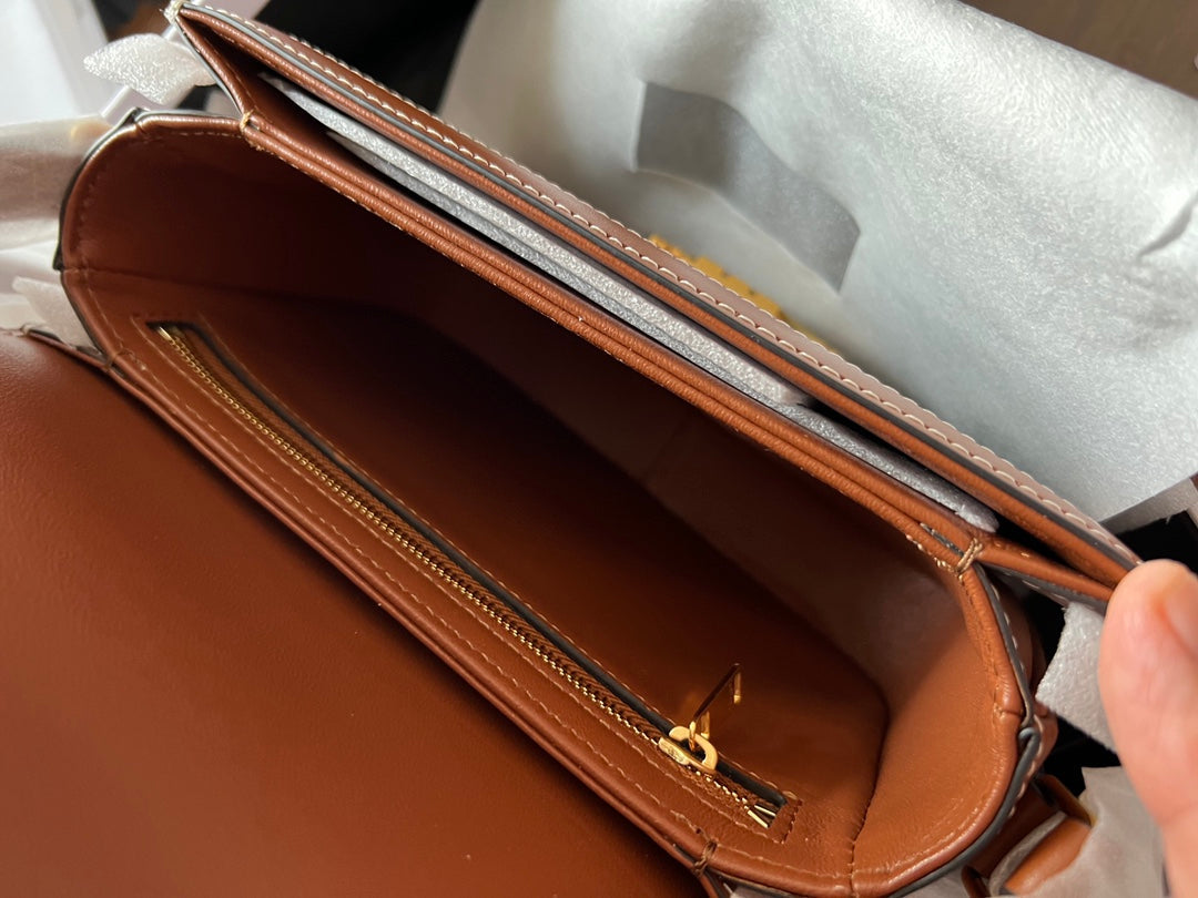 TEEN TRIOMPHE 18.5 TAN MONOGRAM TOILE CUIR DE VEAU MARRON