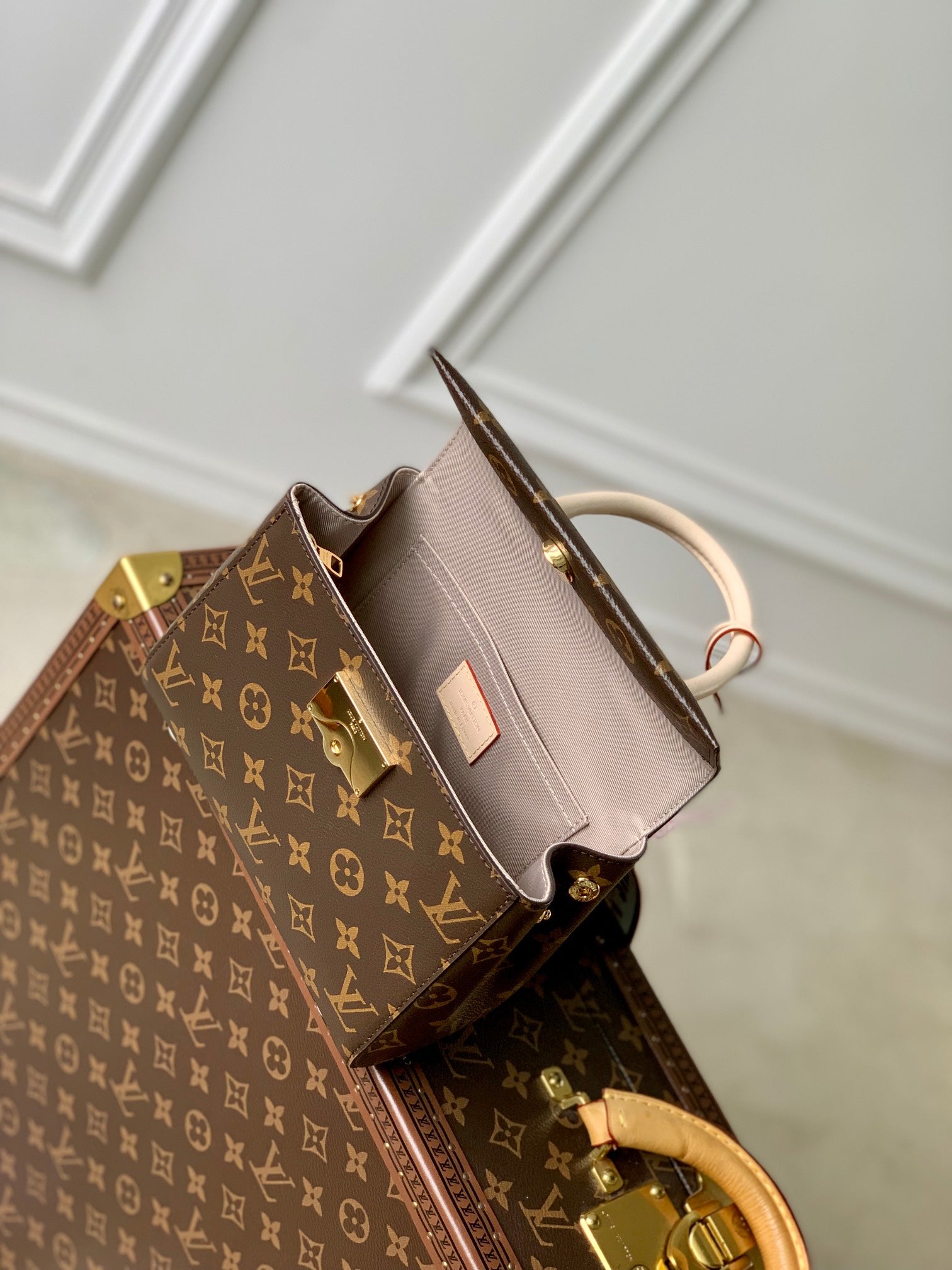 CLUNY MINI 20 EN TOILE MONOGRAMME MARRON