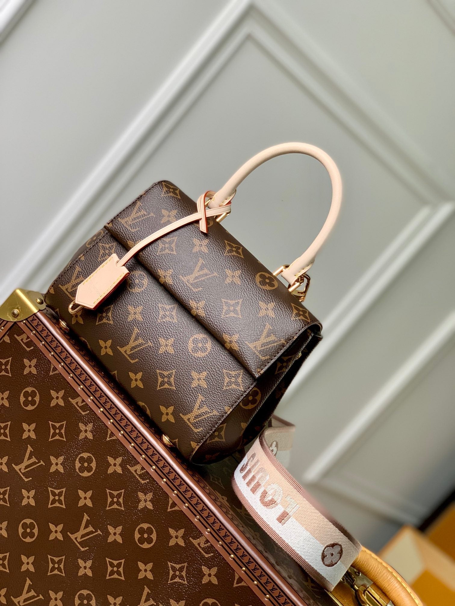 CLUNY MINI 20 EN TOILE MONOGRAMME MARRON