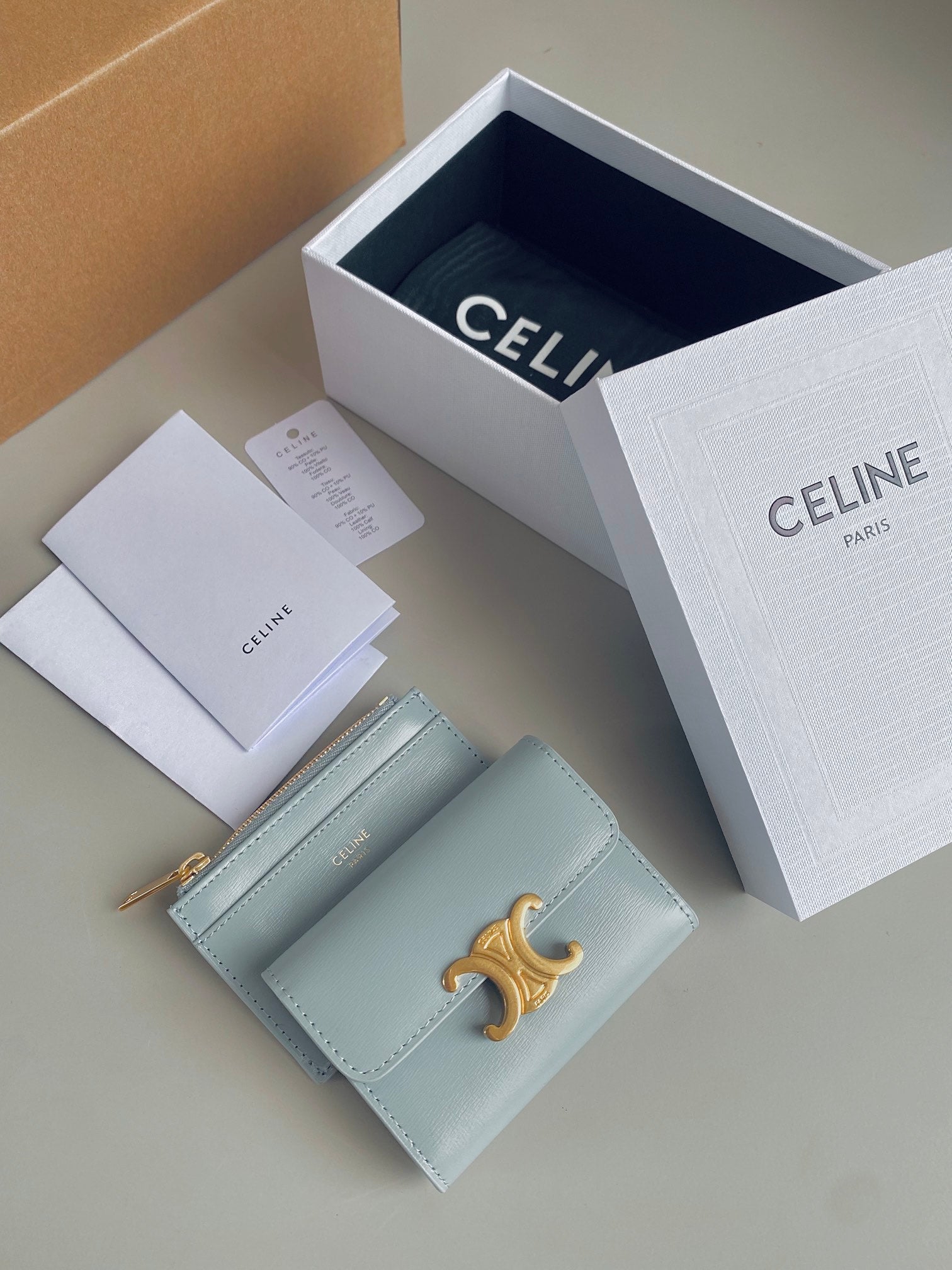 PORTEFEUILLE TRIPHOME 9 DEUX-EN-UN EN CUIR DE VEAU BLEU GLACIER
