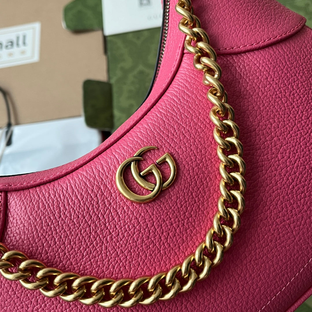 SAC À BANDOULIÈRE 25 EN CUIR DE VEAU ROSE VIF, QUINCAILLERIE DORÉ