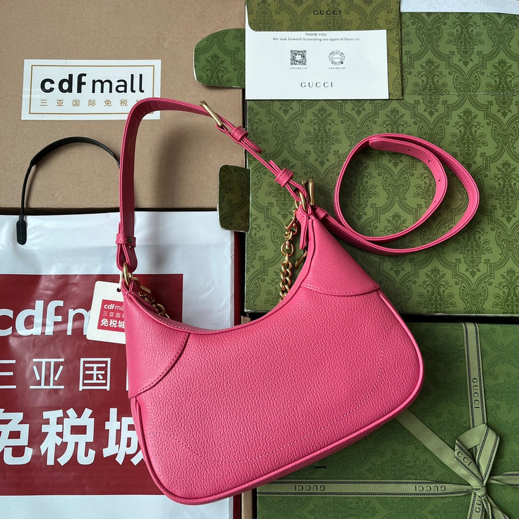 SAC À BANDOULIÈRE 25 EN CUIR DE VEAU ROSE VIF, QUINCAILLERIE DORÉ