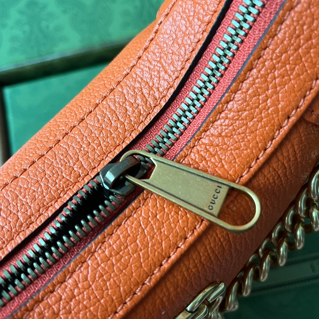 SAC À BANDOULIÈRE 25 EN CUIR DE VEAU ORANGE QUINCAILLERIE DORÉ