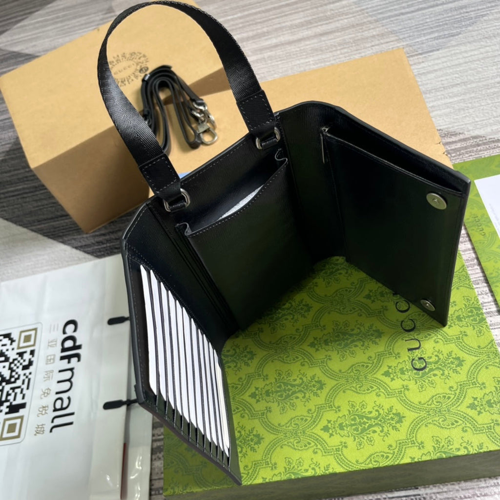 Pochette à fermoir GG 20 en toile noire et cuir de veau