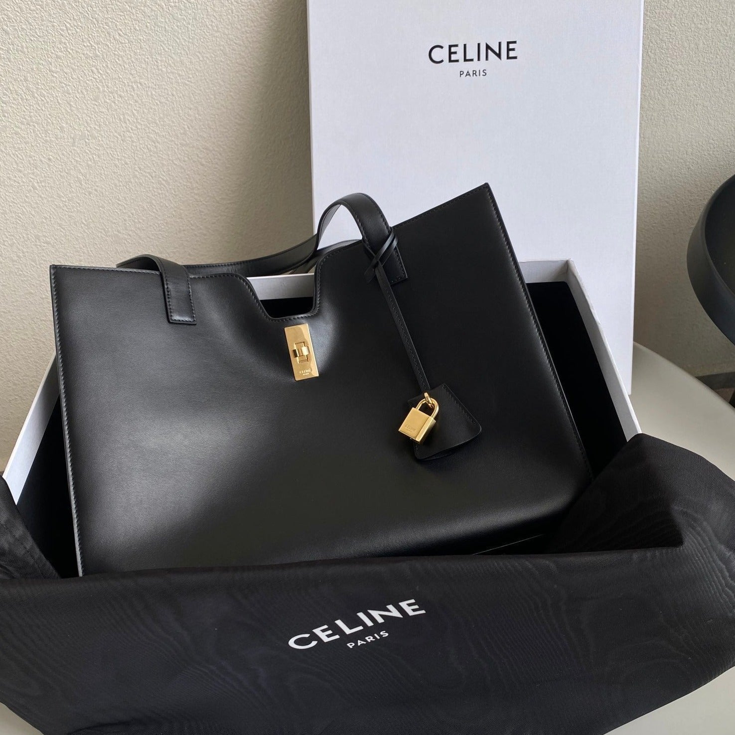 CABAS TRIOMPHE 37 NOIR EN CUIR DE VEAU LISSE