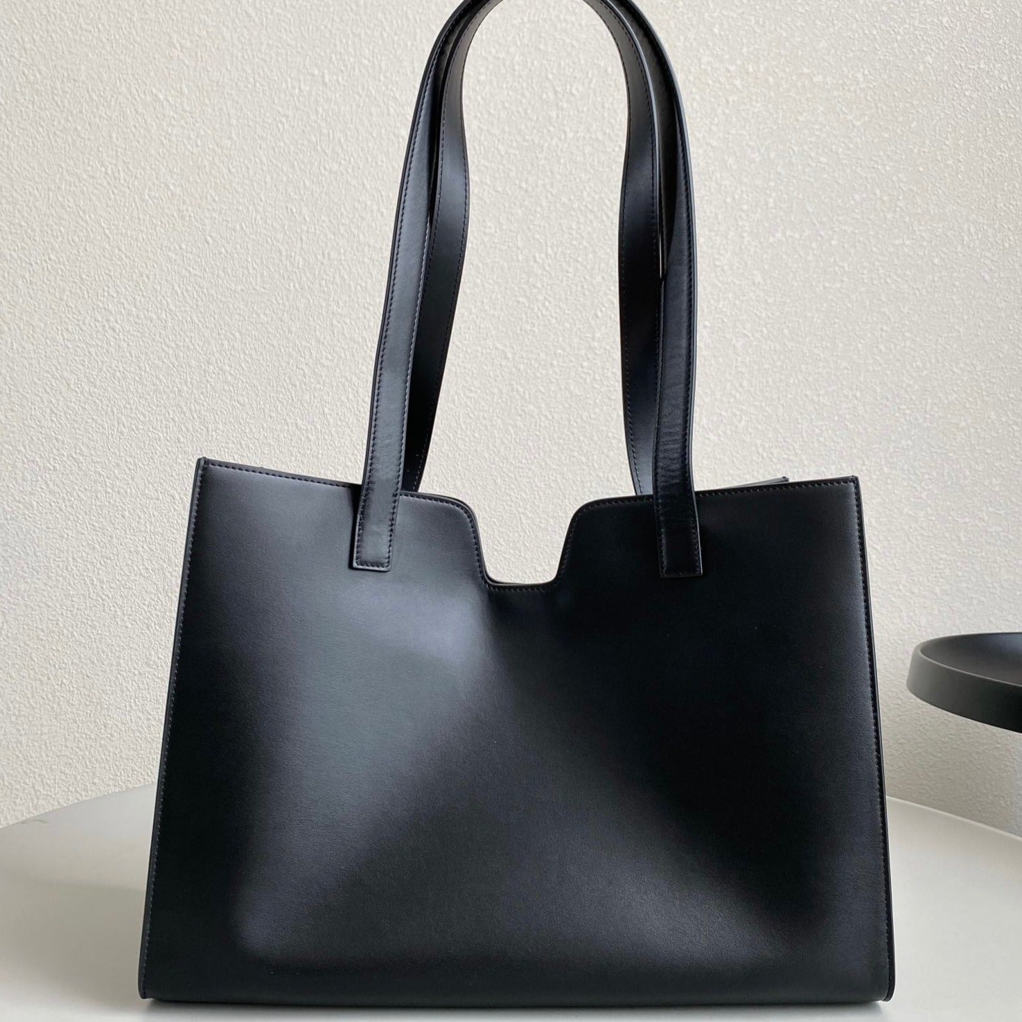 CABAS TRIOMPHE 37 NOIR EN CUIR DE VEAU LISSE