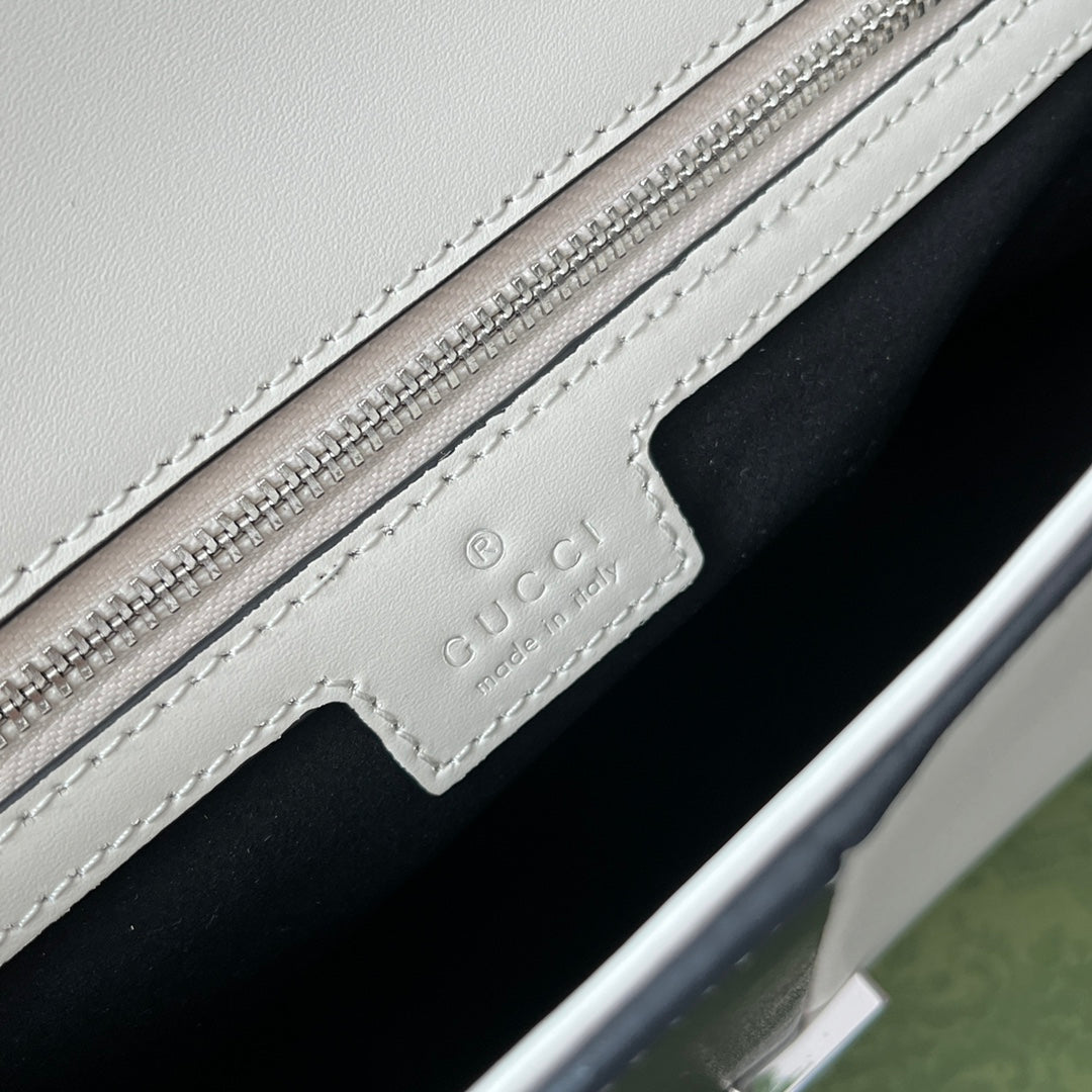 PETIT SAC À BANDOULIÈRE 27 EN CUIR DE VEAU NOIR ET BLANC