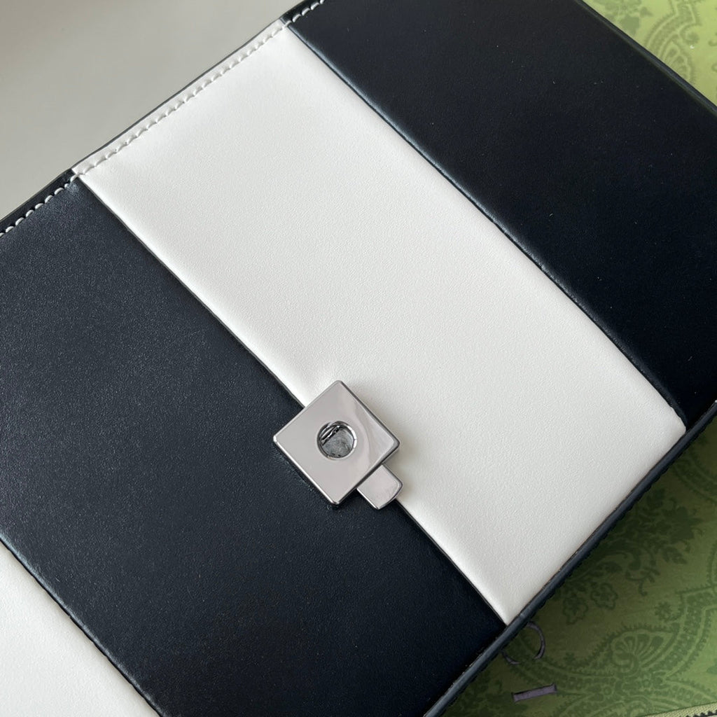 PETIT SAC À BANDOULIÈRE 27 EN CUIR DE VEAU NOIR ET BLANC