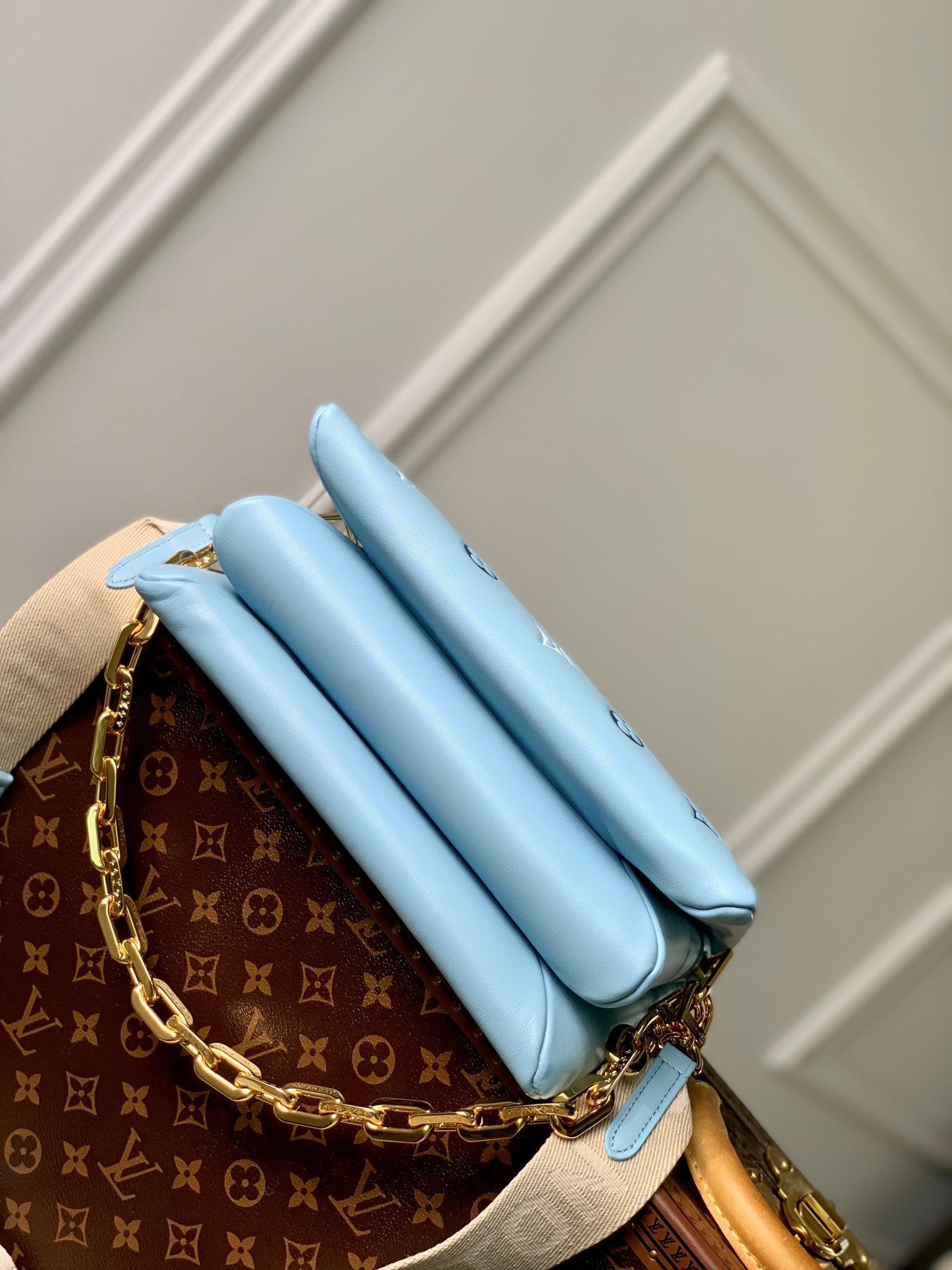 COUSSIN PM 26CM CLOUD BLUE WHITE MONOGRAM EMPREINTE CALFSKIN