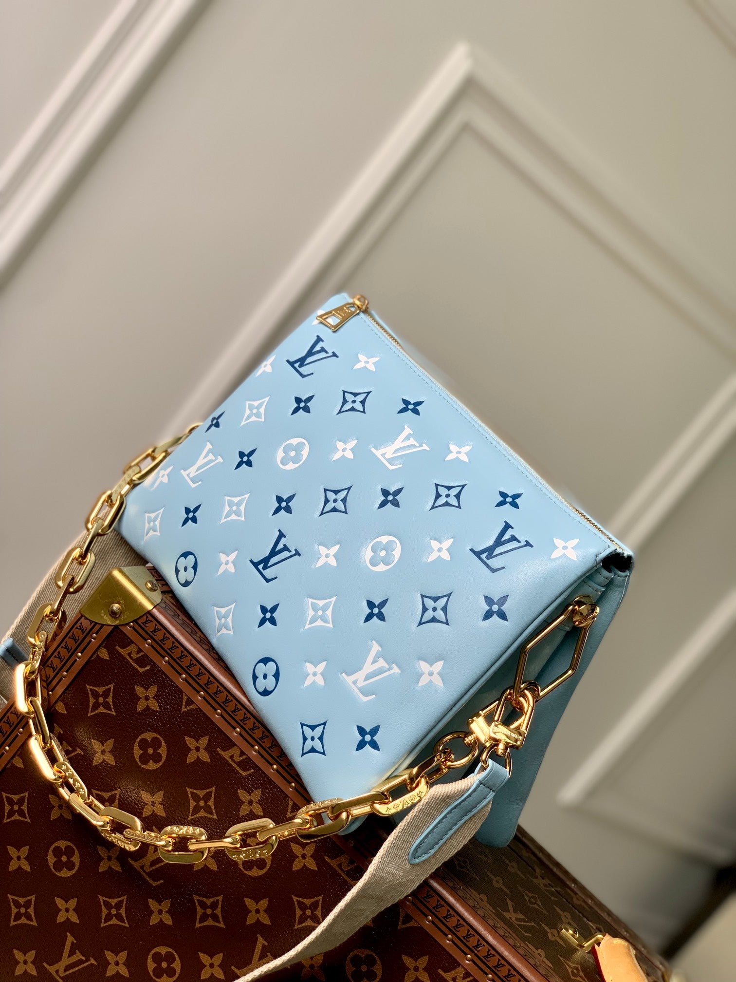 COUSSIN PM 26CM CLOUD BLUE WHITE MONOGRAM EMPREINTE CALFSKIN