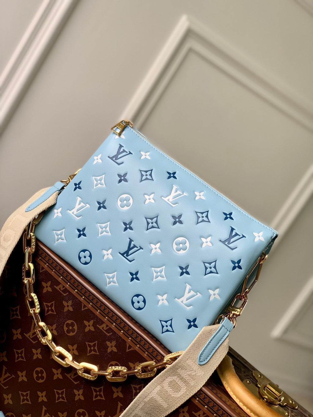COUSSIN PM 26CM CLOUD BLUE WHITE MONOGRAM EMPREINTE CALFSKIN