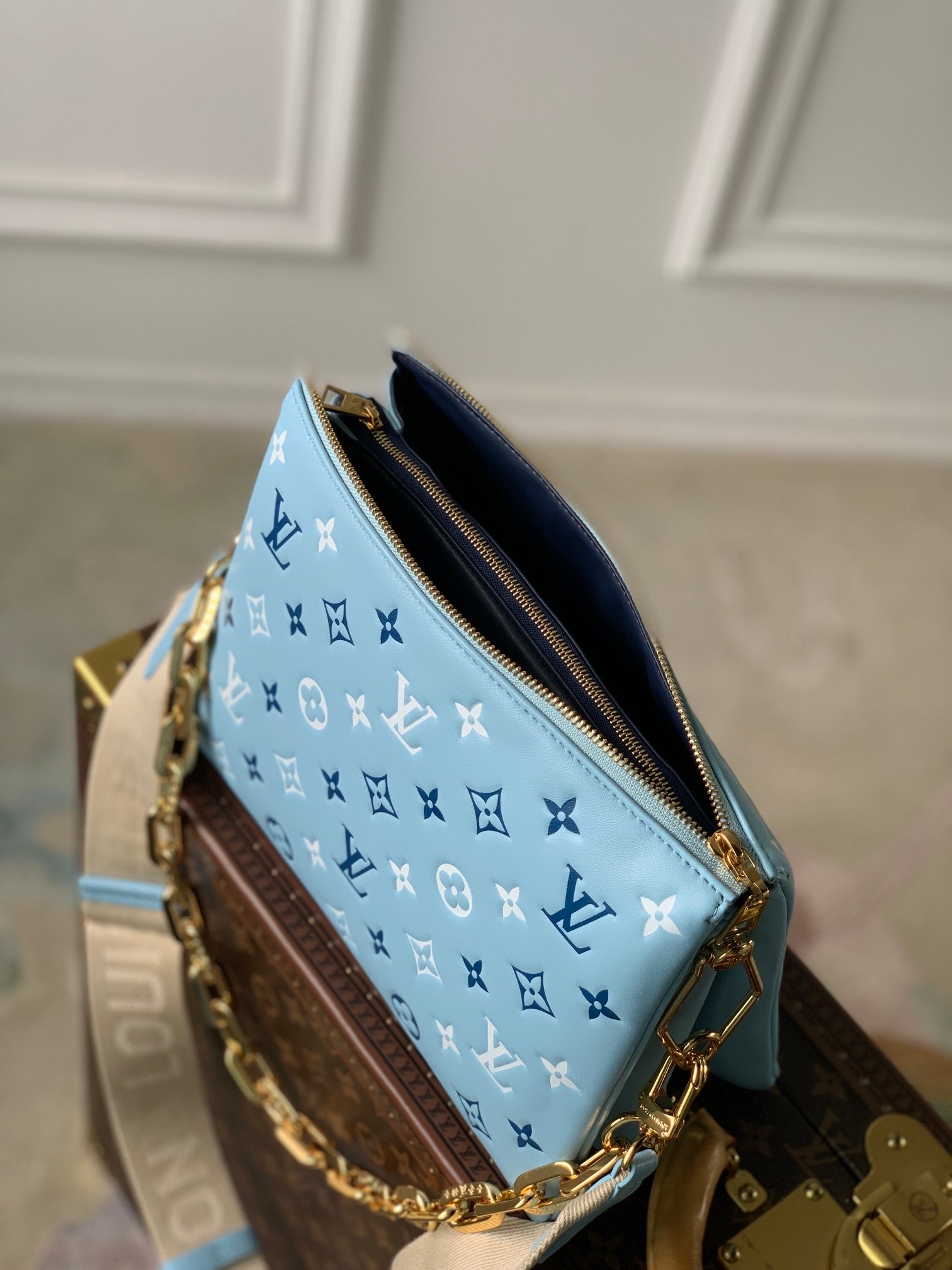 COUSSIN PM 26CM CLOUD BLUE WHITE MONOGRAM EMPREINTE CALFSKIN