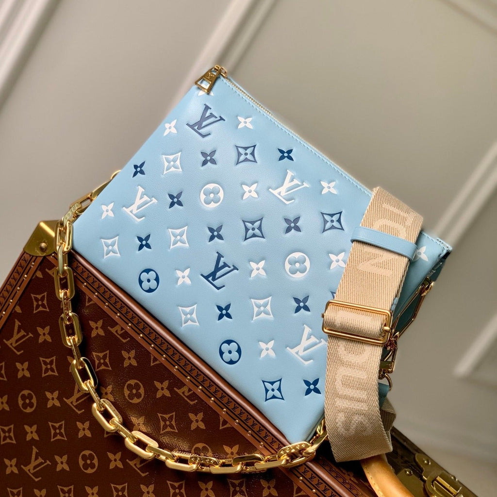 COUSSIN PM 26CM CLOUD BLUE WHITE MONOGRAM EMPREINTE CALFSKIN