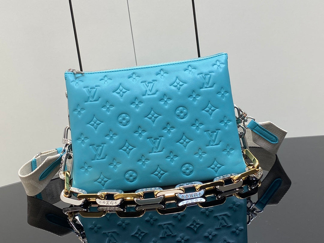 COUSSIN PM 26CM CUIR DE VEAU EMPREINTE MONOGRAMME BLEU TIFFANY 