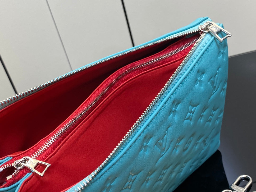 COUSSIN PM 26CM CUIR DE VEAU EMPREINTE MONOGRAMME BLEU TIFFANY 