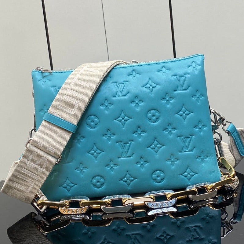 COUSSIN PM 26CM CUIR DE VEAU EMPREINTE MONOGRAMME BLEU TIFFANY 