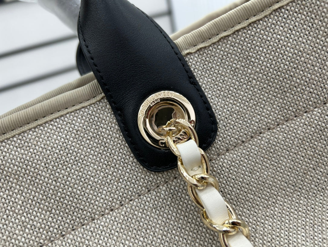 SAC CC DEAUVILLE EN TWEED CUIR NOIR QUINCAILLERIE DORÉ 34