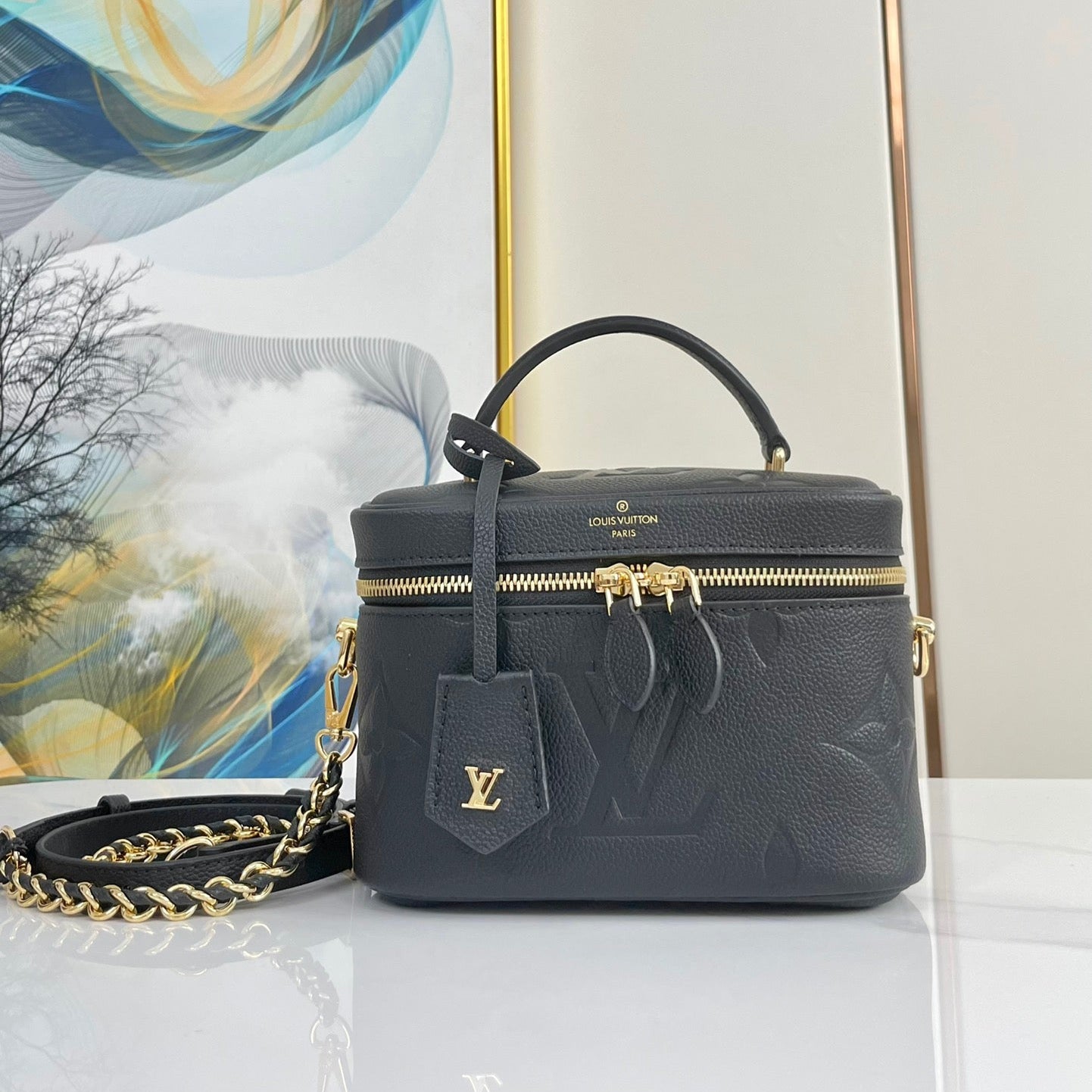 VANITY 19 EN CUIR DE VEAU ESTAMPÉ MONOGRAMME NOIR ET QUINCAILLERIE DORÉ