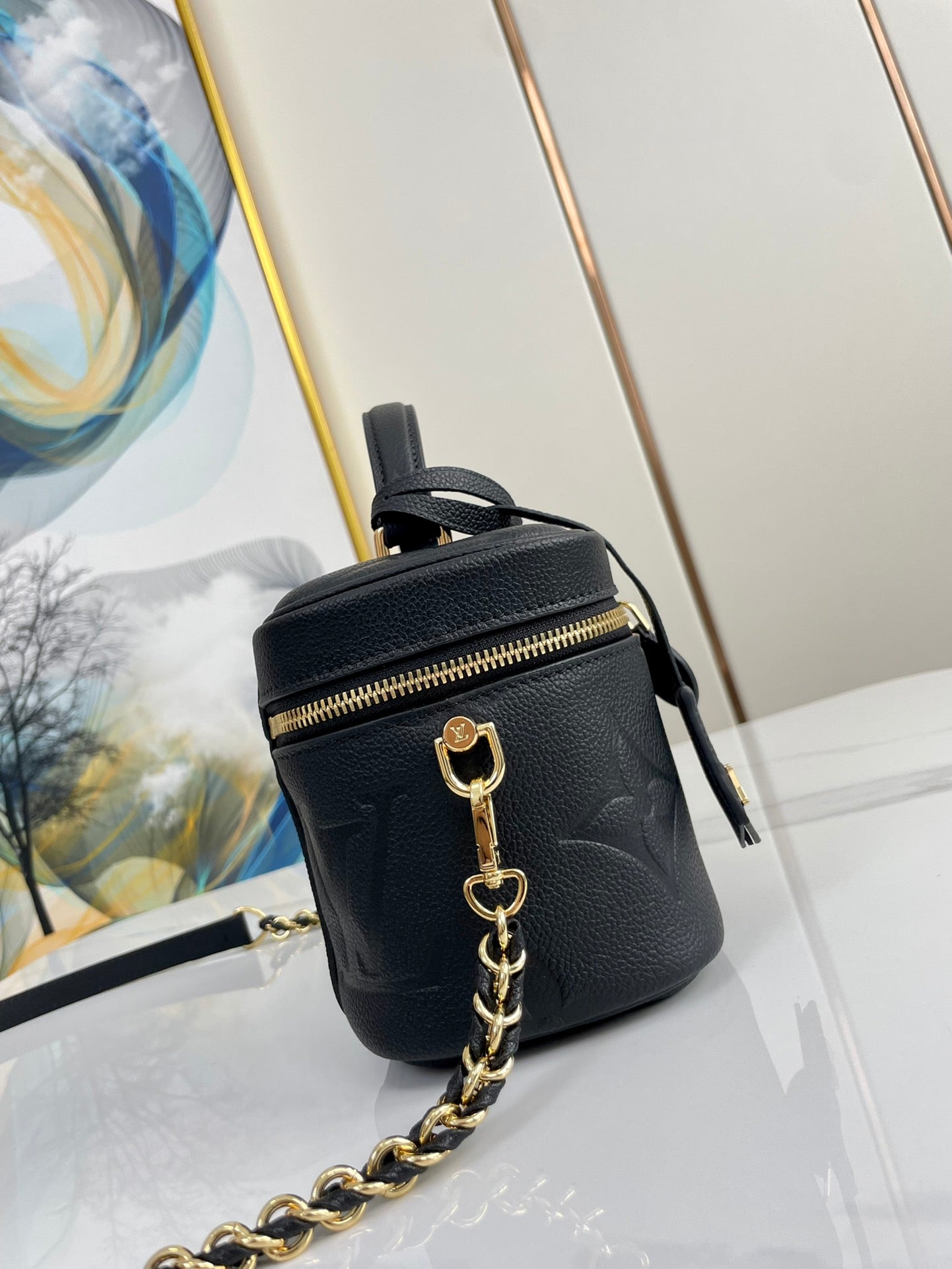 VANITY 19 EN CUIR DE VEAU ESTAMPÉ MONOGRAMME NOIR ET QUINCAILLERIE DORÉ